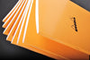 RHODIA Staplebound 14.8x21cm Grid Orange #119184C